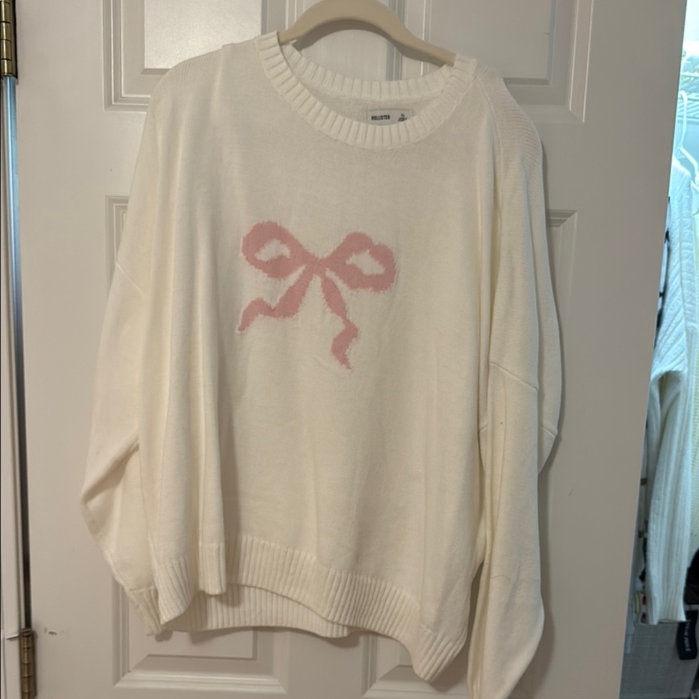 Hollister White and Pink Crew Neck Sweater with Bow Design